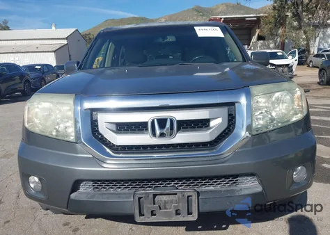 2009 Honda Pilot Touring z USA, uszkodzony, nr VIN 5FNYF38869B016103
